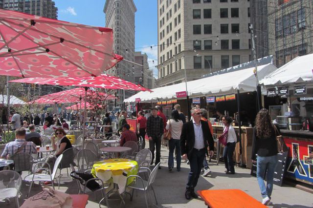 Mad. Sq. Eats, the outdoor pop-up food market, returned today for its annual spring residency across from Madison Square Park. From May 2nd through May 30th, 11 a.m. to 9 p.m. daily, it will form one prong (the other two being Shake Shack and Eataly) of the Madison Square Triangle Of Delicious. 30 vendors have food and drink on offer, from Mexican barbecue to Mediterranean soul food. Cheerful Marimekko prints cover the Bloomberg-standard metal tables and cafe chairs, and a convivial atmosphere reigns; strangers share tables and conversations alike at lunch hour and in the evenings. David Berliner, chair of the Madison Square Park Conservancy, which hosts the event, says he's "thrilled" to see "restauranteurs bring their delicious gifts to the neighborhood...you'll see a huge amount of diversity; people with kids, older people, people of every color and culture, that mix of cultures that's reflected in the food, which we curate carefully to reflect the diversity of NYC and of the world."To save you the time of shuffling through every vendor—crucial, given that if you want a seat on a nice day, showing up early and being decisive is essential—we've picked some of the yummiest treats on offer.     (Ben Miller/Gothamist) 
